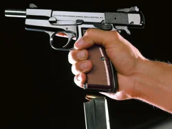 Hi-Power Pistol pulling magazine