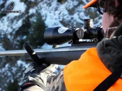 Hunting in snow with stainless steel X-Bolt rifle.