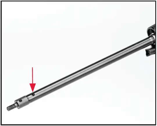 Place a few drops of oil in the opening in the action tube.
