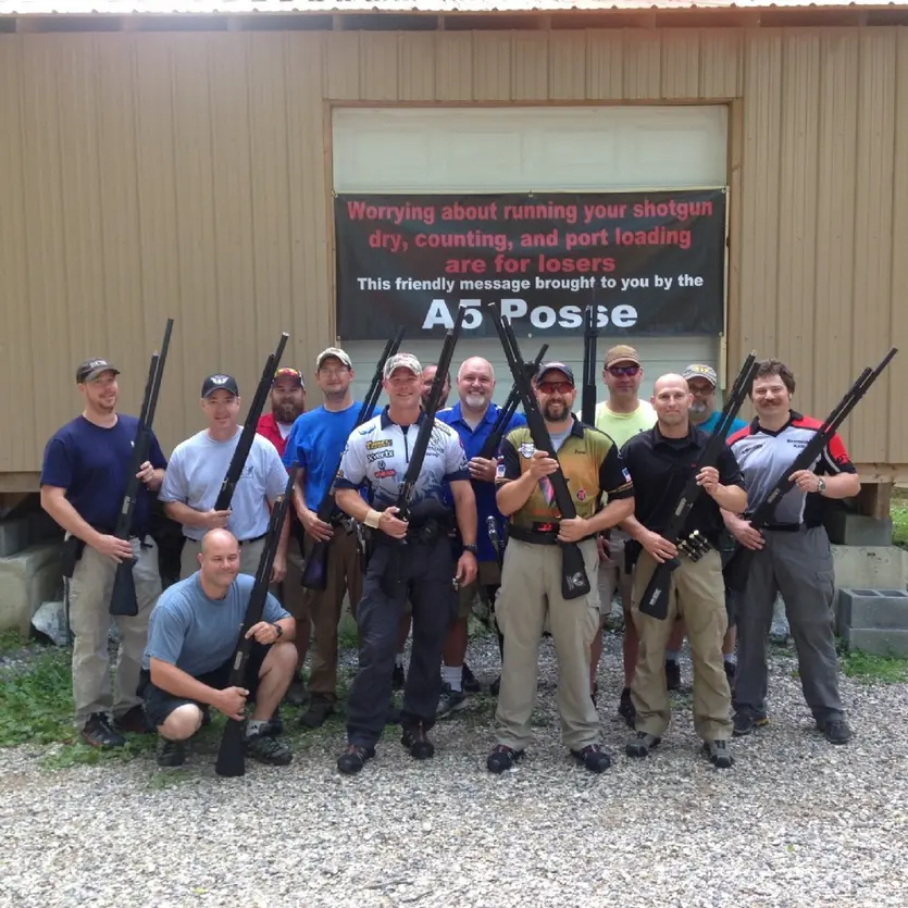 Greg Jordan posing with shotgun and the A-5 Posse