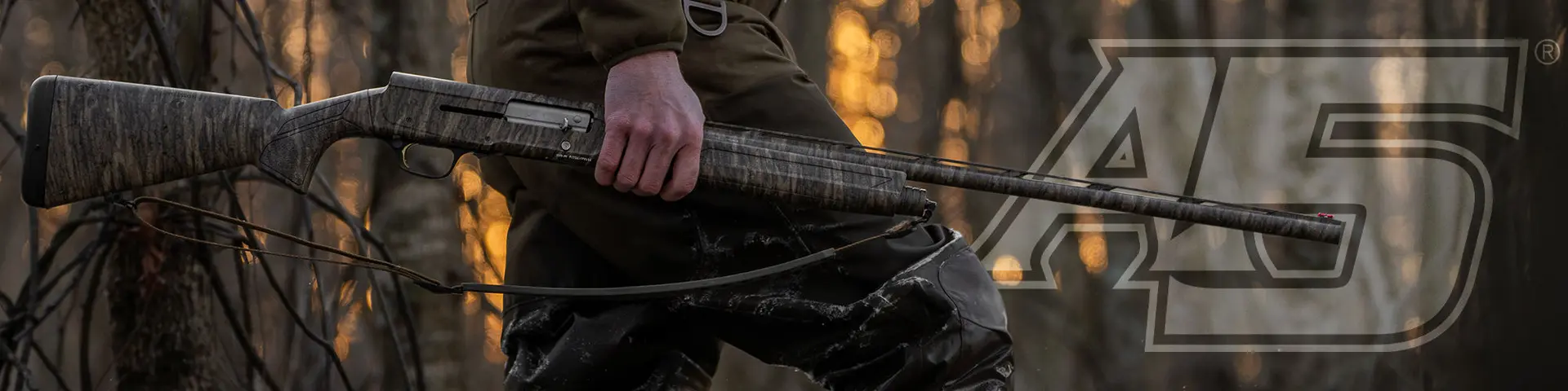 A5 shotgun in hand in flooded timber