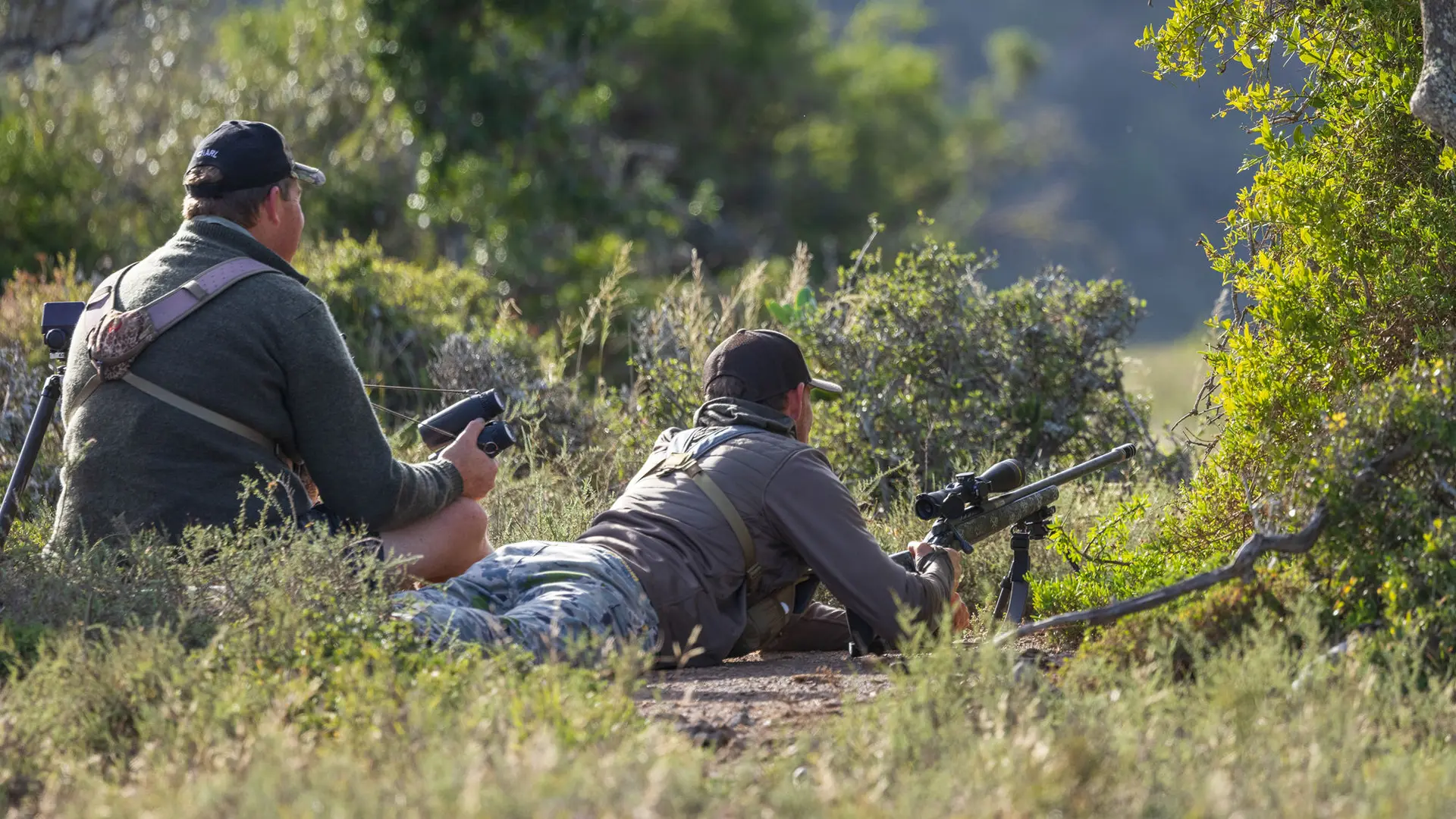 Two Hunters looking down range