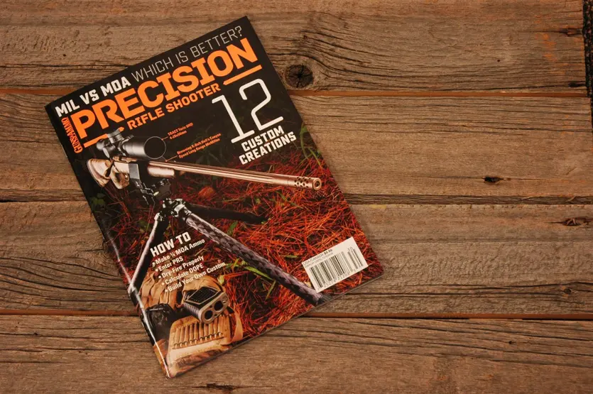X-Bolt Long Range McMillan rifle on catalog cover