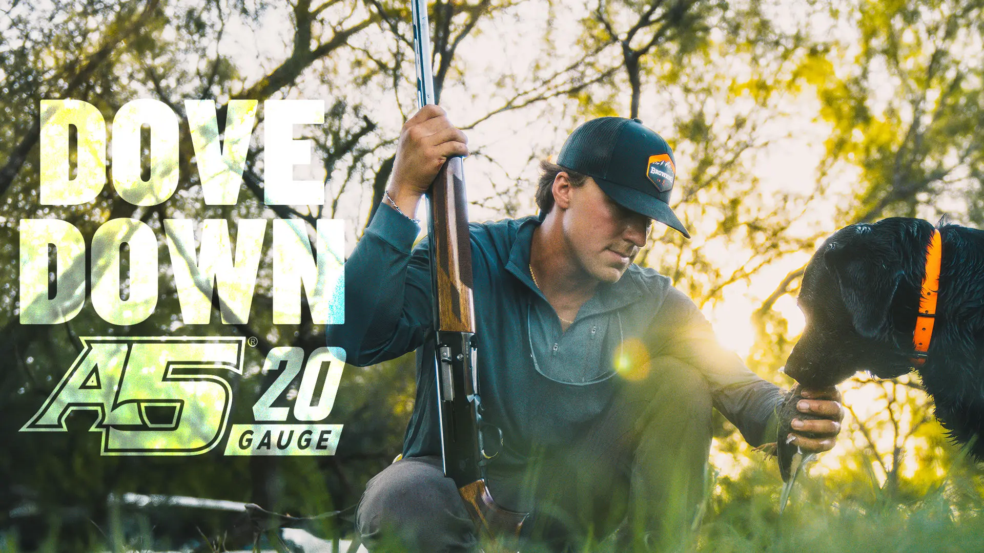 hunter with a5 shotgun and dove with dog