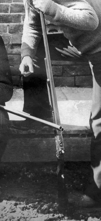 Close-up of one of the early Winchester Model 1893 Shotguns