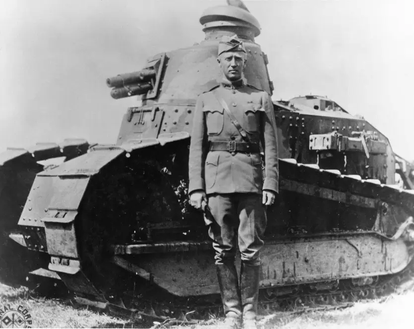 Typical WWI-era tank with young Lt. Col. George S. Patton in WWI.