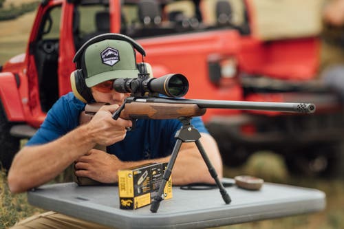 Shooting from bench with X-Bolt bolt-action rifle.