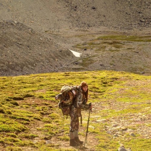 Female hunter on a Big Horn Sheep Pack Out