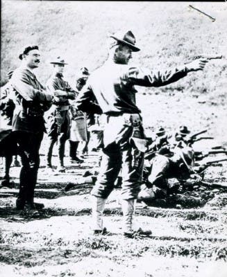U.S. Army Officer training with a 1911 pistol circa 1918 in France.