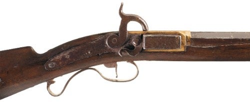 Side view of  a Harmonica rifle that is most likely the work of Jonathan Browning.