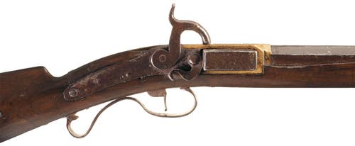 Side view of  a Harmonica rifle that is most likely the work of Jonathan Browning.