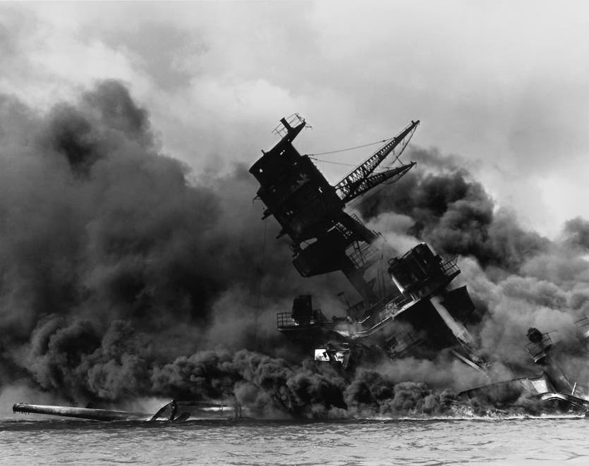 Battleship USS Arizona ablaze and sinking, during the attack at Pearl Harbor. 