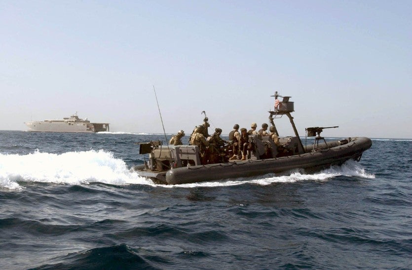 This US Navy Rigid Hull Inflatable Boat sports .50 caliber Browning M2HBs fore and aft.