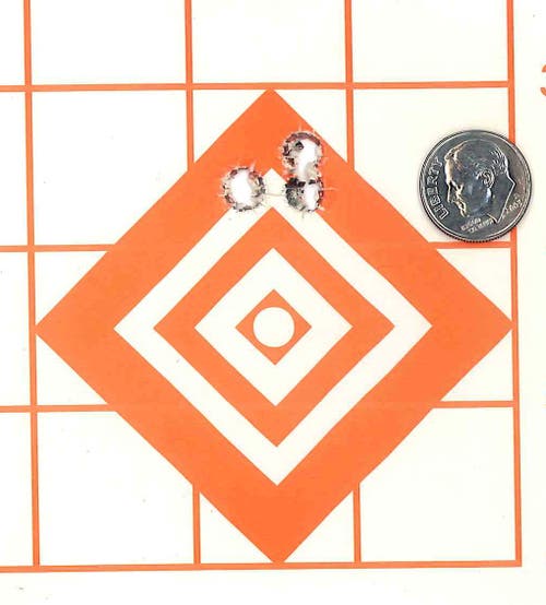Three shot group the size of a dime with an X-Bolt rifle.