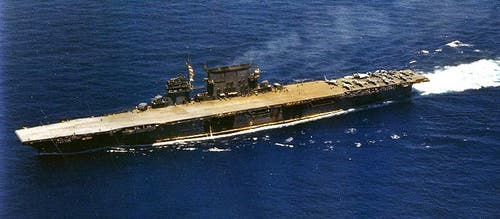 The fleet carrier USS Saratoga underway in the Pacific, circa 1942.