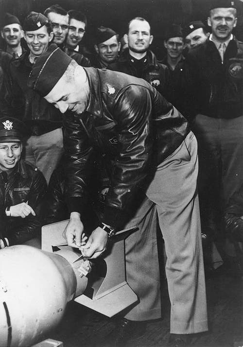 LTCOL Doolittle wires Japan’s friendship medals to the tails of his bombs.