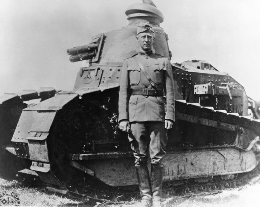 Typical WWI-era tank with young Lt. Col. George S. Patton in WWI.