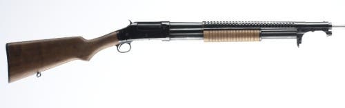 This WWI-era “trench broom” is the John M. Browning-designed Model 1897 pump shotgun built by Winchester. 