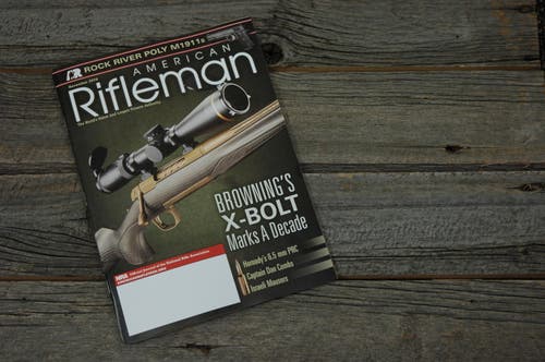 X-Bolt rifle on American Rifleman catalog cover