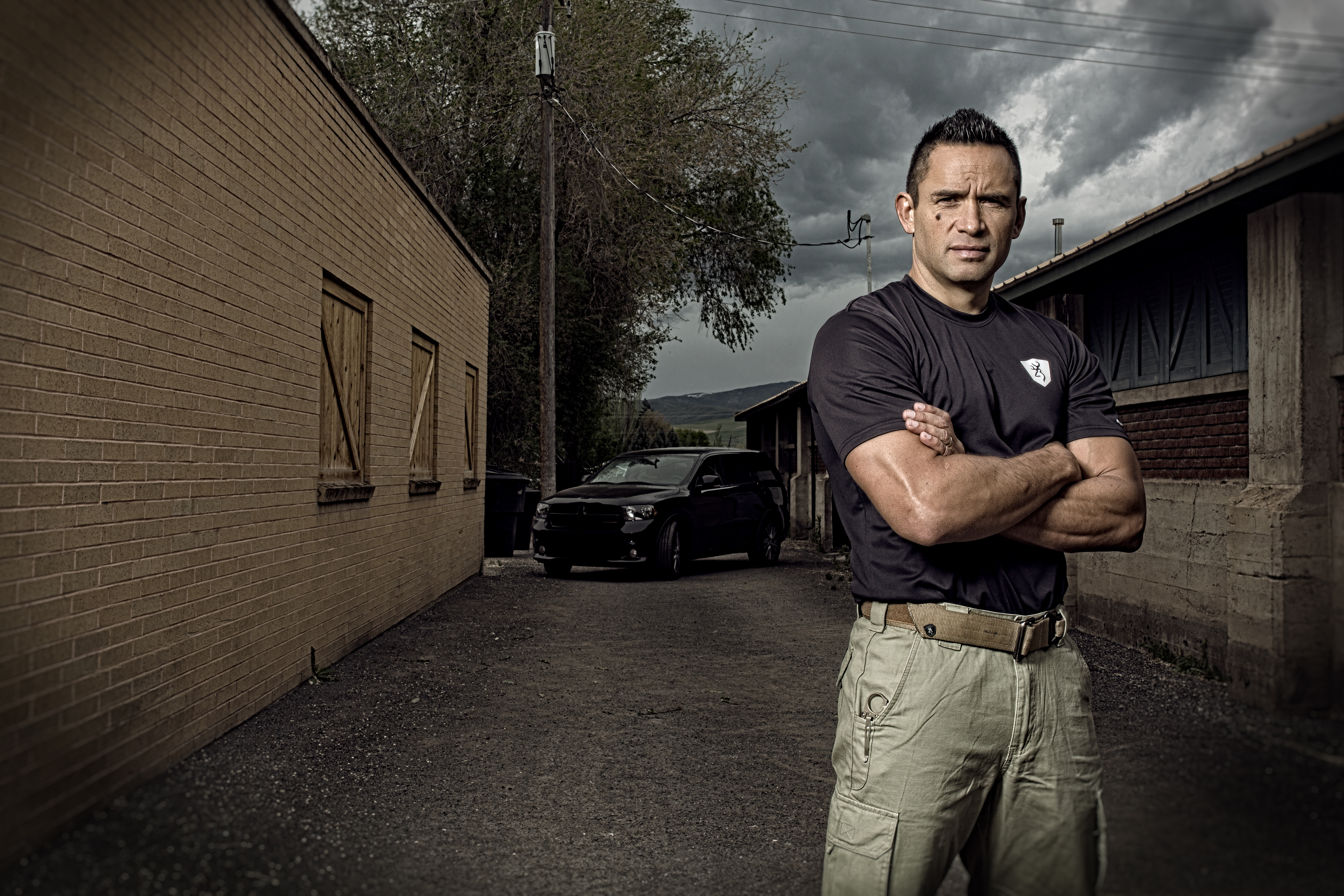 JAred Wihongi in alley with black car