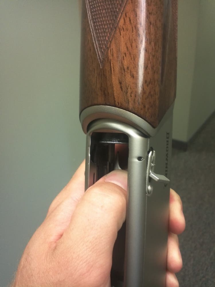 Magazine cut-off switch on receiver of Maxus shotgun