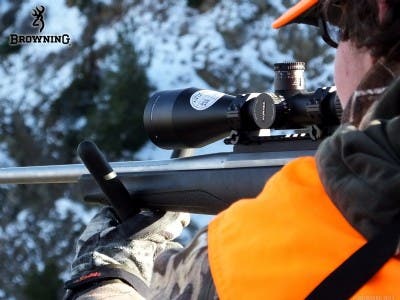 Hunting in snow with stainless steel X-Bolt rifle.