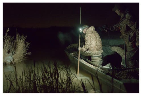 Wide Angle Pluse in use in a john boat duck hunting. Decoys setting in dark.