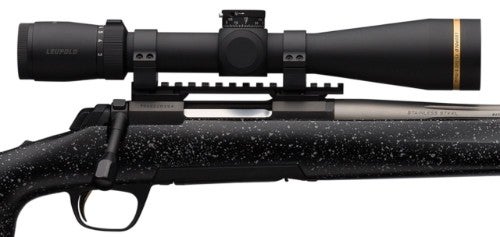 Scope mounted on X-Bolt rifle with Picatinny rail.