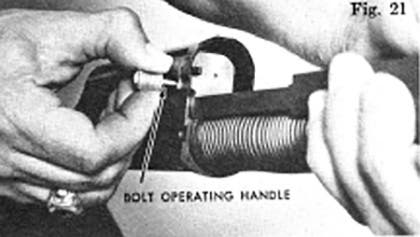 Removing the bolt operating handle