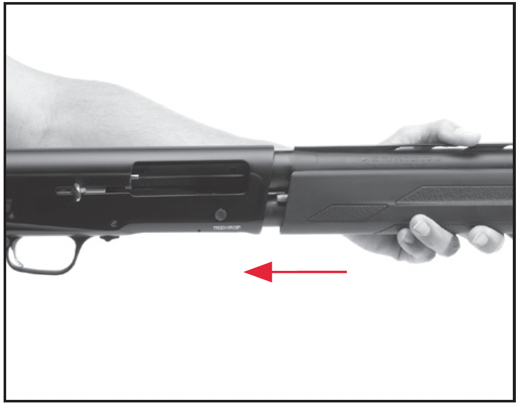 Slide the barrel and forearm over the magazine tube and insert the barrel extension into the receiver
