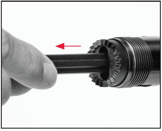 Remove the three-shot adaptor (plug).